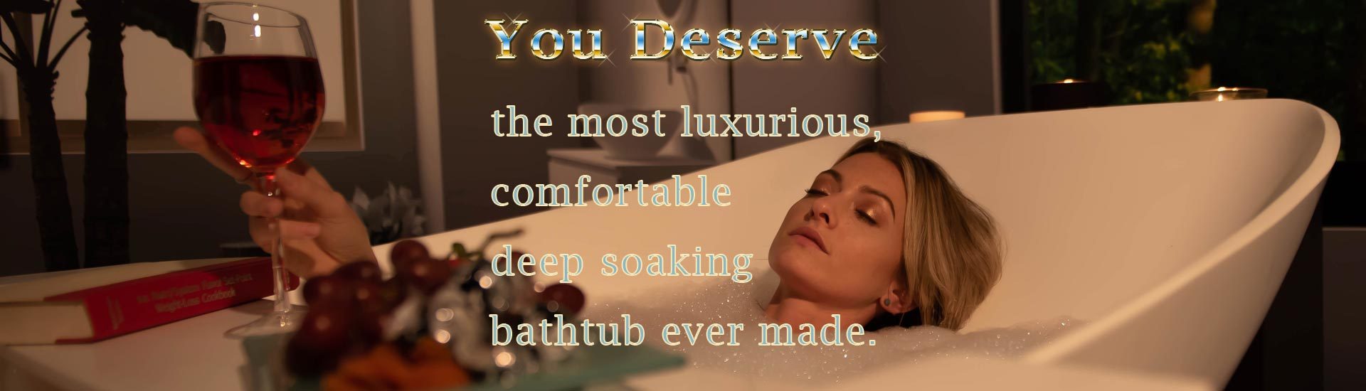 Woman relaxing in a luxury deep soaking freestanding hammock bathtub with a glass of wine